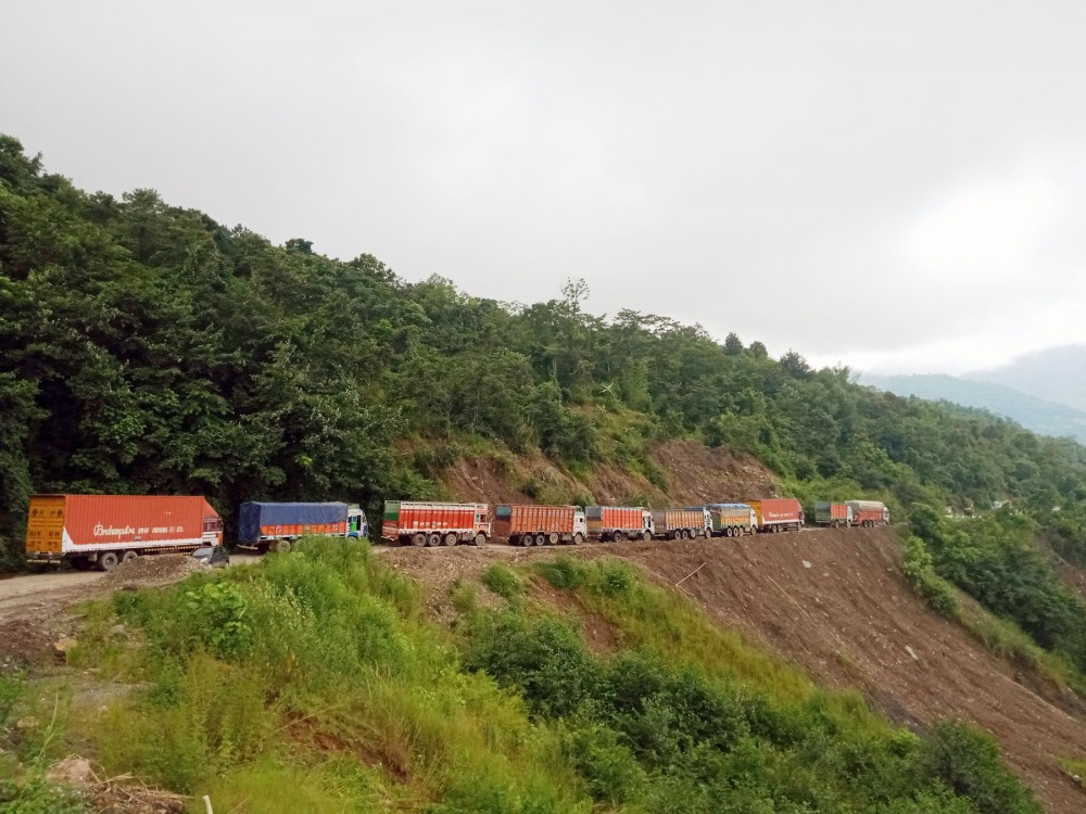 Representative Image: Trucks are seen stranded after a landslide along National Highway 29. (Morung File Photo)