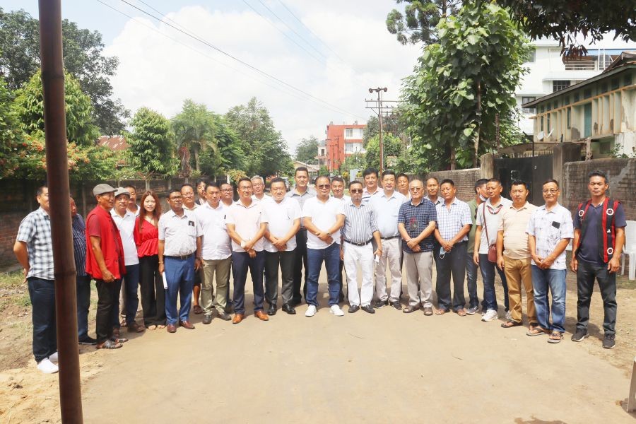 H Tovihoto Ayemi with the DMC administrator and colony leaders of Fellowship and Supply colonies during the inauguration of newly renovated road on July 2.