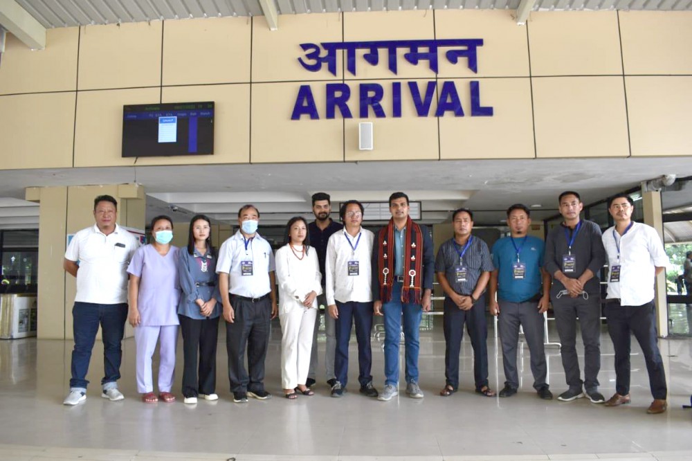 Grandmaster Ankit Rajpara with others at the Dimapur Airport on July 10 after he landed with the Chess Olympiad Torch. (DIPR Photo)