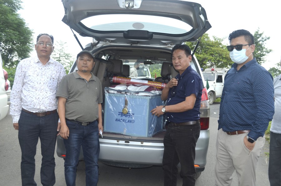 Authorised officials standing in-front of the ballot box and other related materials upon arrival at Dimapur Airport on July 13. (Morung Photo)