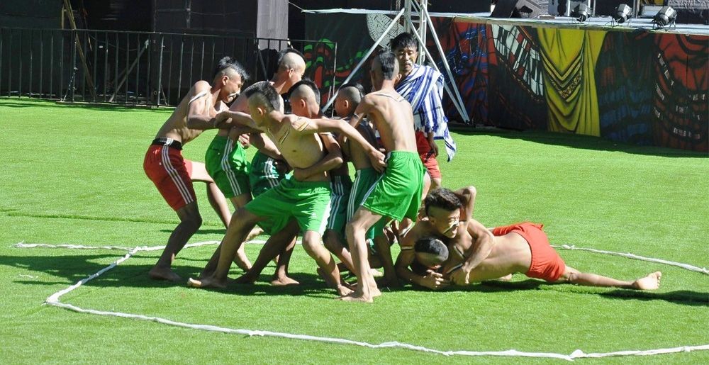 Youths from Changki village under Mokokchung district demonstrate the indigenous game ‘Hekko’ during a presentation by State Youth Resources and Sports Department during the 2019 edition of the Hornbill Festival at the Naga Heritage village Kisama on December 7.  (DIPR/Morung File Photo)