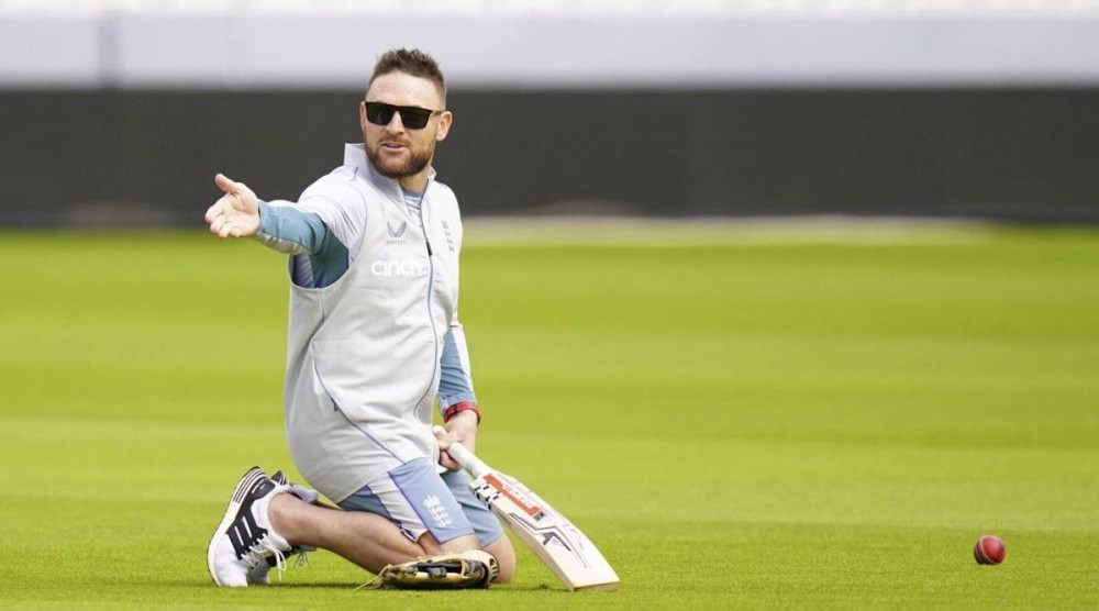 New England men's Test coach Brendon McCullum gestures during a nets session (AP)