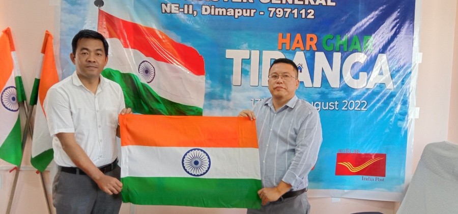 (Right) Som Kamei, Postmaster General, NE-II Region and Justin Bongcher, Assistant Superintendent, PO, Dimapur with the tricolour at the India Post Dimapur office on August 6. (Morung Photo)