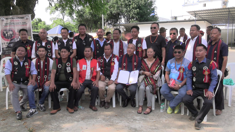 Grand Master, Israel G Xuivi, recipient of Taekwon-do Hall of Fame along with officials and well-wishers at Dimapur Airport on August 30. (Morung Photo)