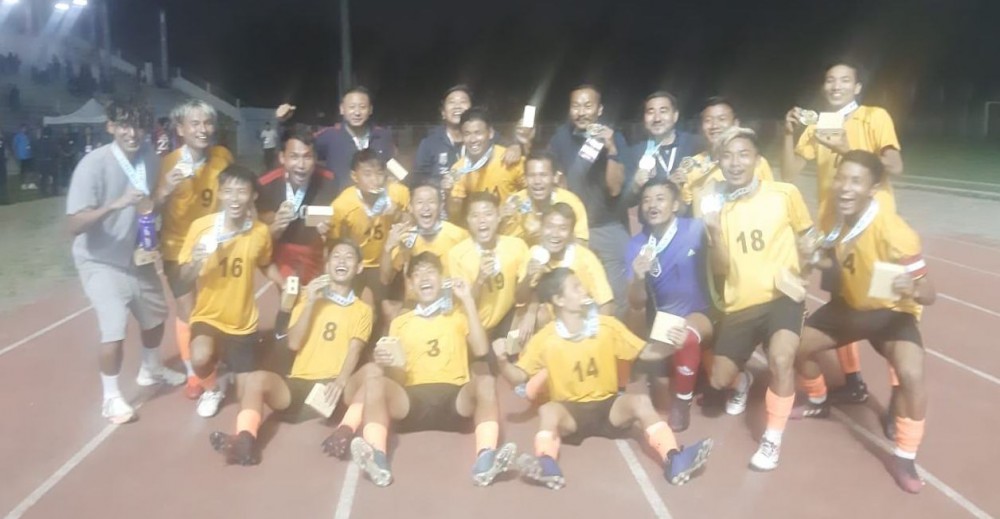 Dimapur football team celebrates as they emerged as football champion title of the 2nd Nagaland Olympic & Paralympic Games 2022 at Indira Gandhi Stadium Kohima on August 26. Dimapur defeated Tseminyu 4-3 in the final match. In bronze medal match, Peren downed Phek 2-1.  (Morung Photo)