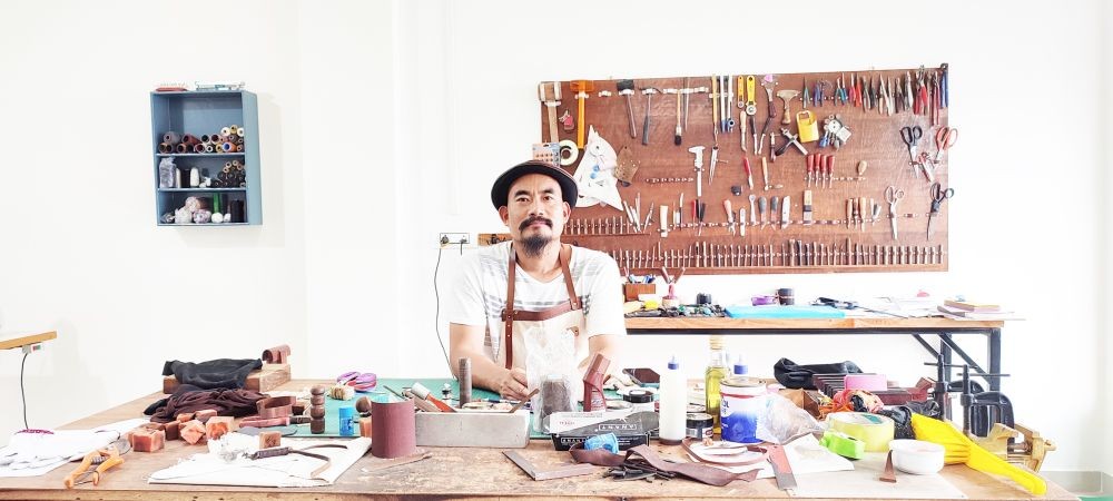 Veta Huprem in his leatherwork studion in Kohima. (Morung Photo)