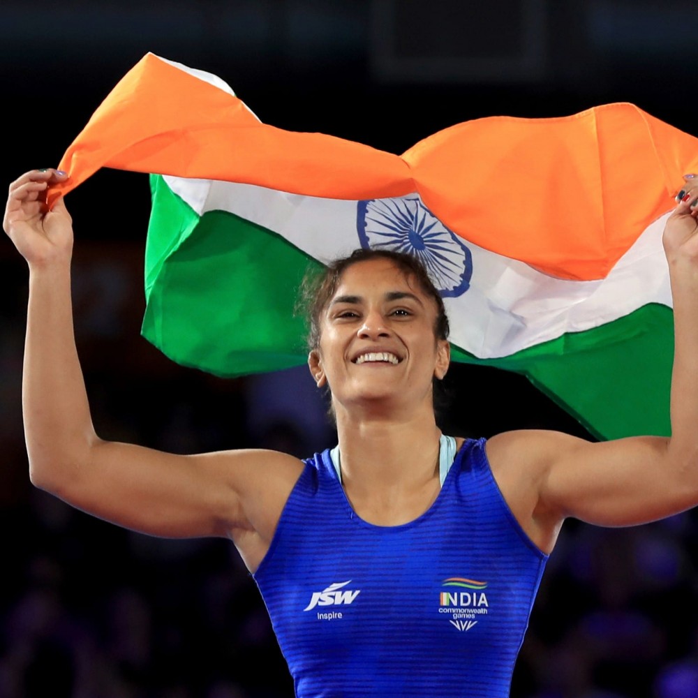 India's Vinesh Phogat celebrates winning against Sri Lanka's Chamodya Keshani Maduravalage Don during the Women's 53kg Nordic System wrestling at the Coventry Arena on day nine of the 2022 Commonwealth Games in Coventry, England, Saturday Aug. 6, 2022. (Photo: AP)