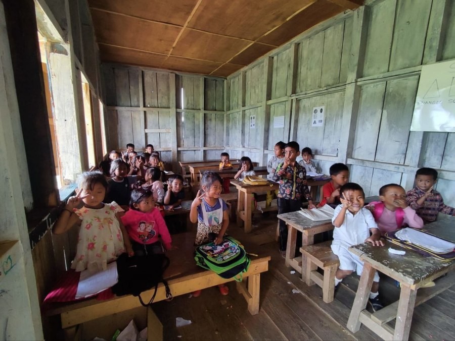 Kindergarten kids happily pose for a photo in their classroom in GPS Forest Ward, Pungro Town under Kiphire district. As per the official Census 2011 enumeration of Kiphire, the average literacy rate of Kiphire in 2011 was 69.54 compared to 50.23 of 2001. Gender wise, male and female literacy were 74.88 and 63.96 respectively. (Photo Courtesy: Neike Namdau)