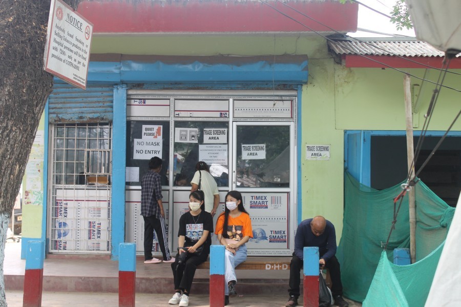 People waiting outside a COVID-19 testing centre located at Dimapur District Hospital. (Morung File Photo)