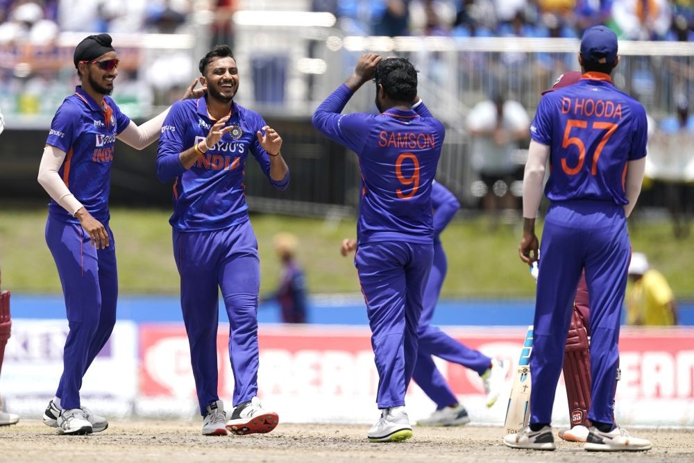 India's Axar Patel, second from left, celebrates after West Indies' Nicolas Pooran was run out during the fourth T20 cricket match, Saturday, Aug. 6, 2022, in Lauderhill, Fla. At left is India's Arshdeep Singh. (AP/PTI)