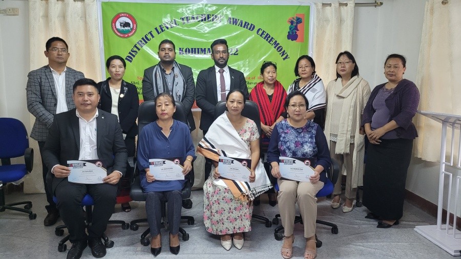 Recipients of Kohima district level teachers’ award 2022 with Shanavas C, Thavaseelan K and others on September 5. (Morung Photo)