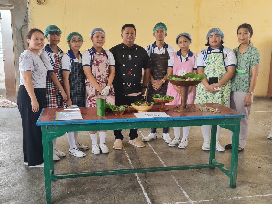 Some of the participants with the judge Joel Basumatary, owner of Smokey Joe’s during the house-wise cooking competition of Little Star Hr Sec School, Dimapur.