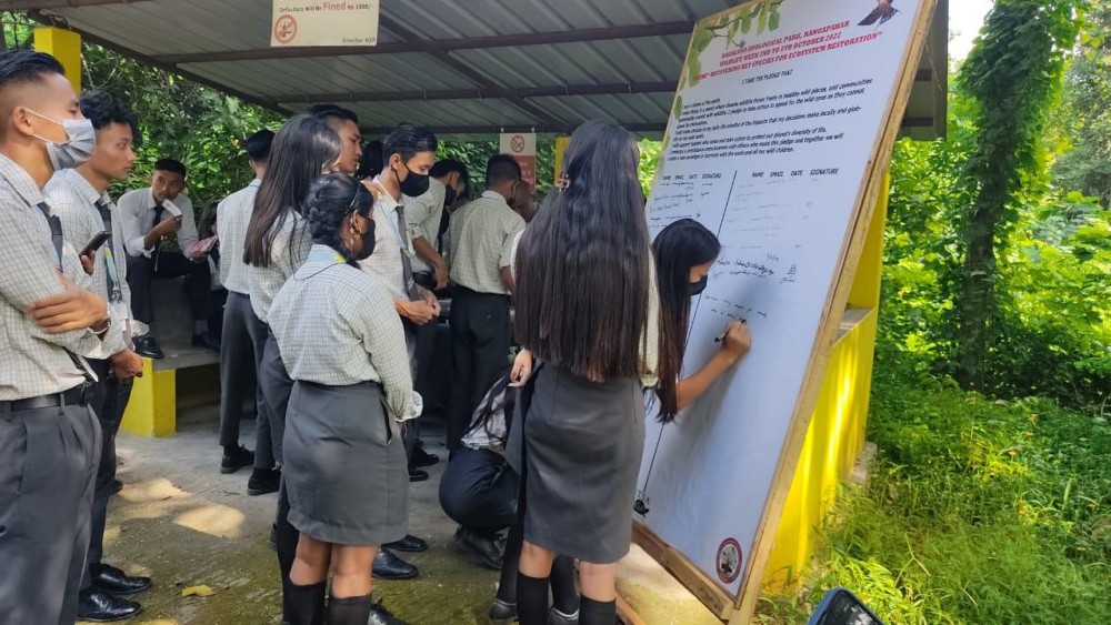 Students take part in the pledge signing campaign marking the 68th Wildlife Week on October 7 and 8 at Nagaland Zoological Park campus.