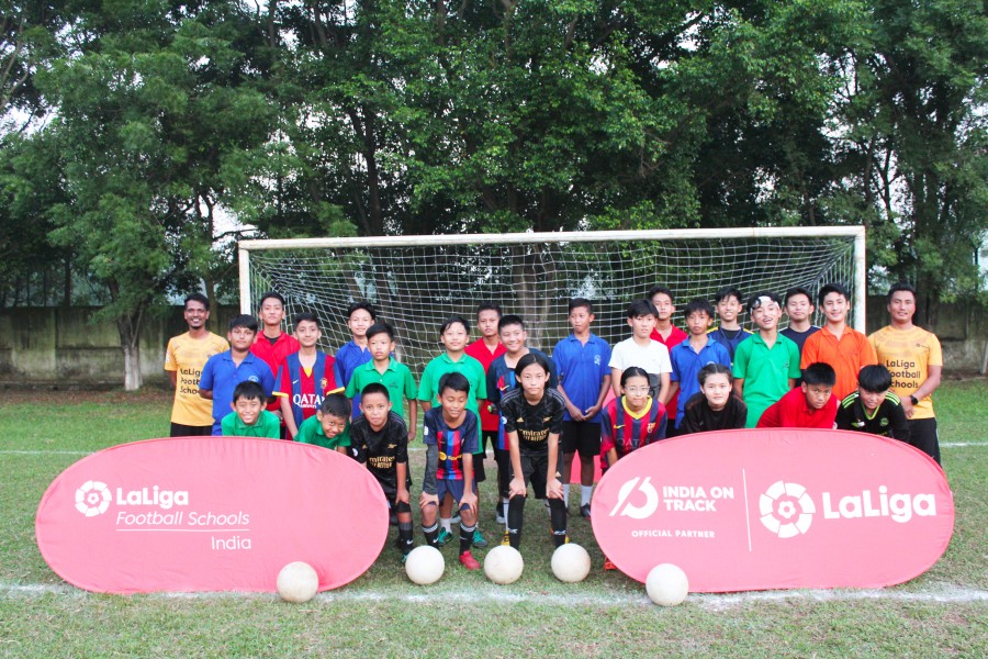 Students along with the two coaches during the two-week long training camp conducted by Hollotoli School and LaLiga Football Schools, India.