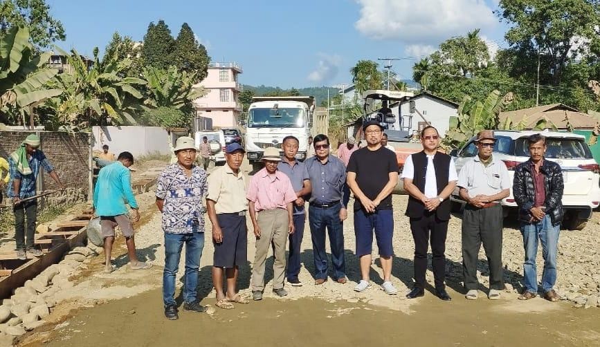 Local MLA Zhaleo Rio, IAS (Retd), Advisor, Sericulture, Excise & Minority Affairs, witnessed and took stock of the road repairing and widening works at Medziphema town from Zero Point till SASRD. Both the MLA and town residents expressed satisfaction and gratefulness to the firm for upgradation of the road beyond the allocated budget. In the image, Zhaleo with the Rokolhou Angami, Director, Naagaamii Infratech Pvt. Ltd, some GBs, town leaders and site inspectors of the firm on November 13. (Photo Courtesy: NDPP 5 Ghaspani-II A/C)