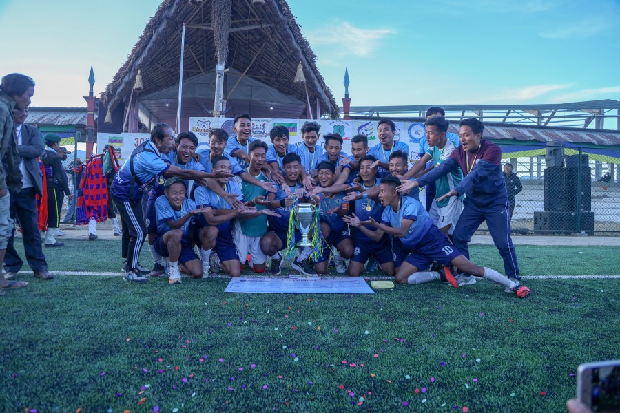 Champions of the 30th Loyem Memorial Trophy, Son Kük Laang (SKL) FC, Noksen town pose with the trophy at Loyem Memorial Astro Turf ground, Tuensang on November 19. (Morung Photo)