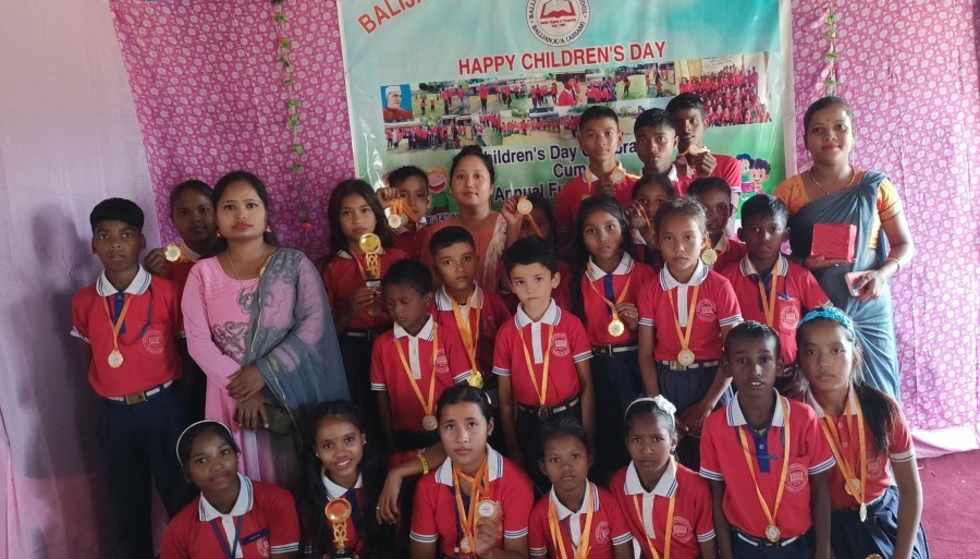 Students and teachers pose for lens after the prize distribution ceremony cum annual day at Balijan English School under Bokajan subdivision Karbi Anglong district of Assam on the eve of Children’s Day celebration on November 14 at the school auditorium. The day was marked with speeches, dance, acts and prize distribution, while the vote of thanks was proposed by Pandey. 