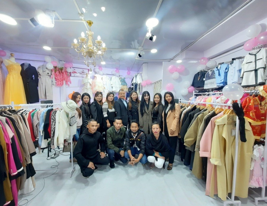 Hotingla Sangtam with others after the grand opening of the second branch of HS Boutique in Kohima on November 16.
