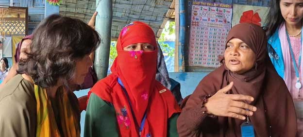 Noeleen Heyzer, UN Special Envoy of the Secretary-General on Myanmar, talks with Rohingya refugees in a camp in Bangladesh. October 2022. Credit: Office of the Special Envoy on Myanmar