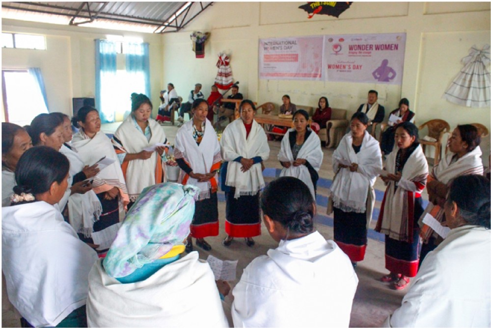 Thetsumi village women folk presenting a special number during the International Women’s Day programme.