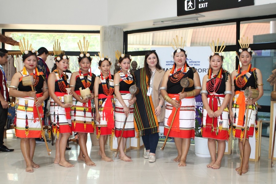 G20 Summit delegate from Romania, Simona with the string artists (Tati singers) on arrival at Dimapur Airport on April 4. The visiting delegate who is visiting North East for the first time commented, ‘the reception was thrilling and exciting.’ (DIPR Photo)