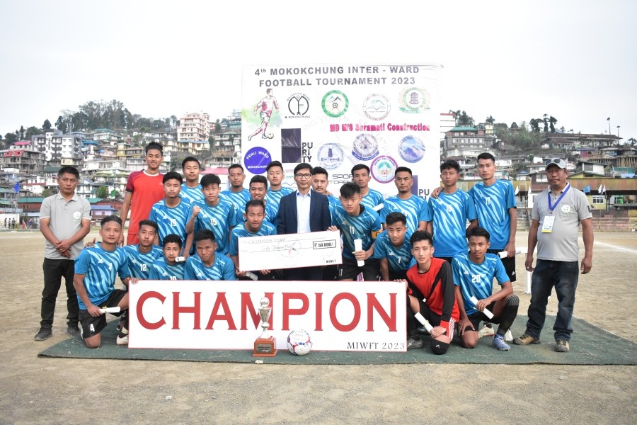Sangtemla Ward, Champions of the Mokokchung Inter-ward Football tournament with the guest of honor, Dr. I. Wati Imchen, Principal, Fazl ali College after the prize distribution ceremony at Imkongmeren Sports Complex, Mokokchung on April 21.