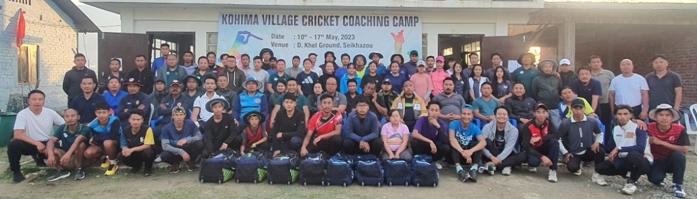 Coaches and organizers with the participants of Kohima village Cricket Coaching Camp on May 17.