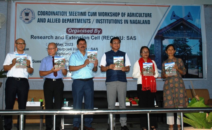 Mhathung Yanthan and others during the release of a compendium comprising of abstracts and recommendations of all research work done in SAS from 2016 to 2022.