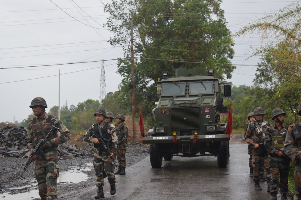 Security forces taking out an area domination exercise.