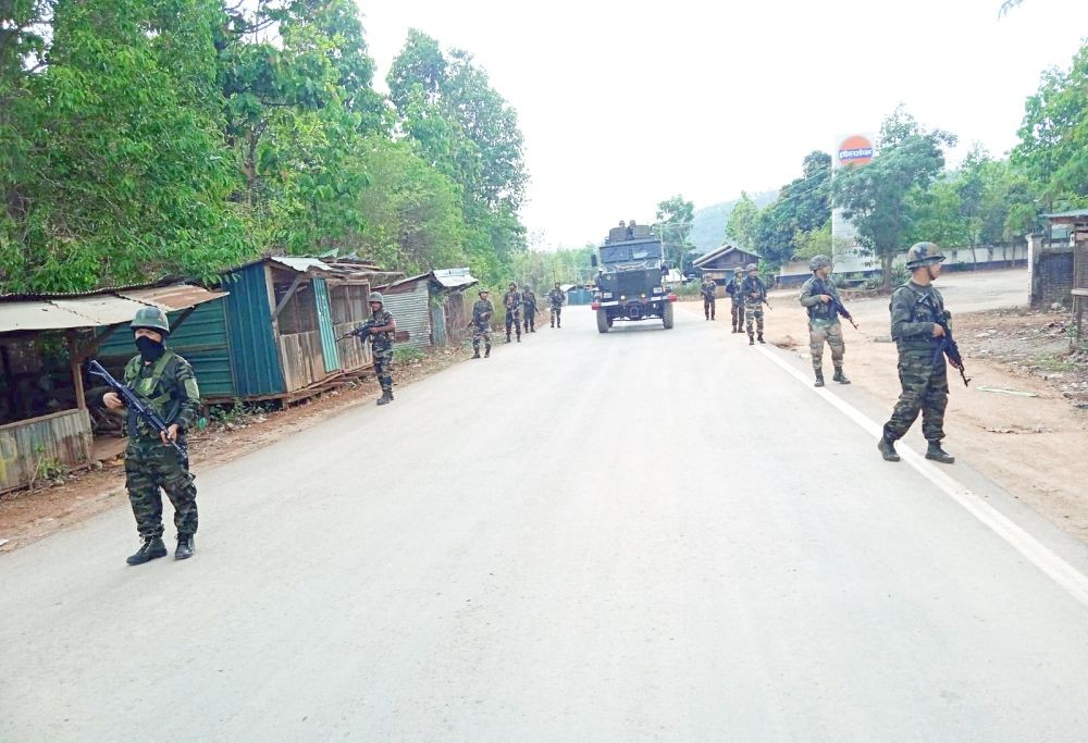 Indian security forces keep vigil along a highway stretch in Manipur. (IANS Photo)