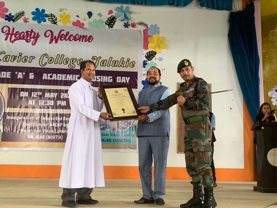 Special guests— Deputy Chief Minister of Nagaland, Y Patton and Major General Vikas Lakhera, Sena Medal, IGAR (North), alongwith the Principal of St Xavier’s College, Jalukie, Dr. Fr. Francis Cheerangal at the programme on May 12. (Photo courtesy: Media Cell Dy CMO)