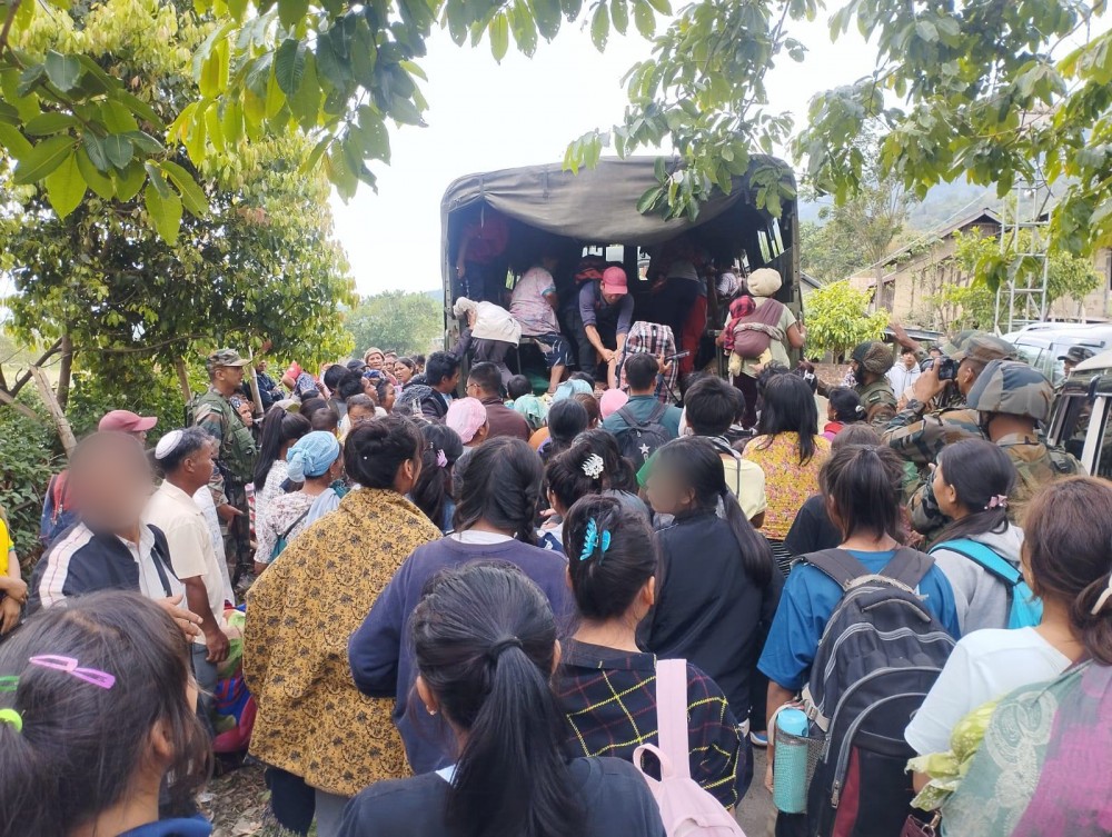 Displaced people being transported to relief areas by security forces in Manipur on May 5. (Photo Courtesy: PRO Defense)