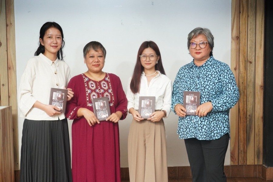 Prof J Longkumer (extreme right) with the author and others during the book release held at DCafe, Kohima on June 23.
