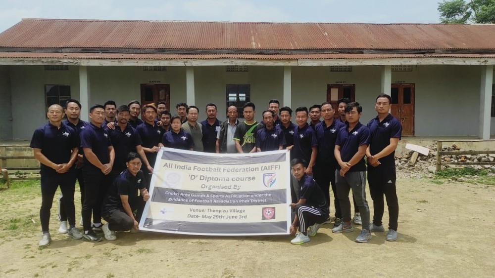 William Koso, coaches and others at Thenyizu village on June 3.