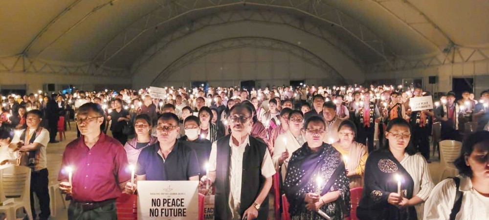 Congregation joined together in prayer during the ‘Candlelight Vigil Standing In Prayer for Manipur’ organised by the Kohima Pastors' Baptist Fellowship at NBCC Convention Centre, Kohima on June 25. (Morung Photo)