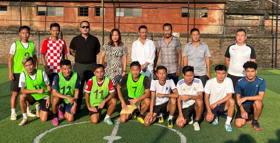 Guest of honour, Lanutoshi Yaden (third from left) along with the players during the kick off ceremony for the two-day Futsal Night Tournament at Junkyard Turf Padampukhuri, Dimapur on June 23. (Morung Photo)
