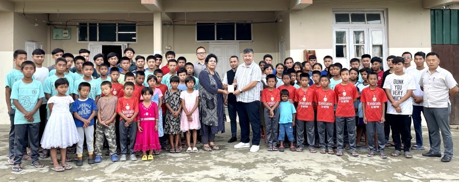 Abu Metha handing over the documents for Zaputuo-u Welfare Fund at Kohima Orphanage and Destitute Home on June 6. (DIPR Photo)