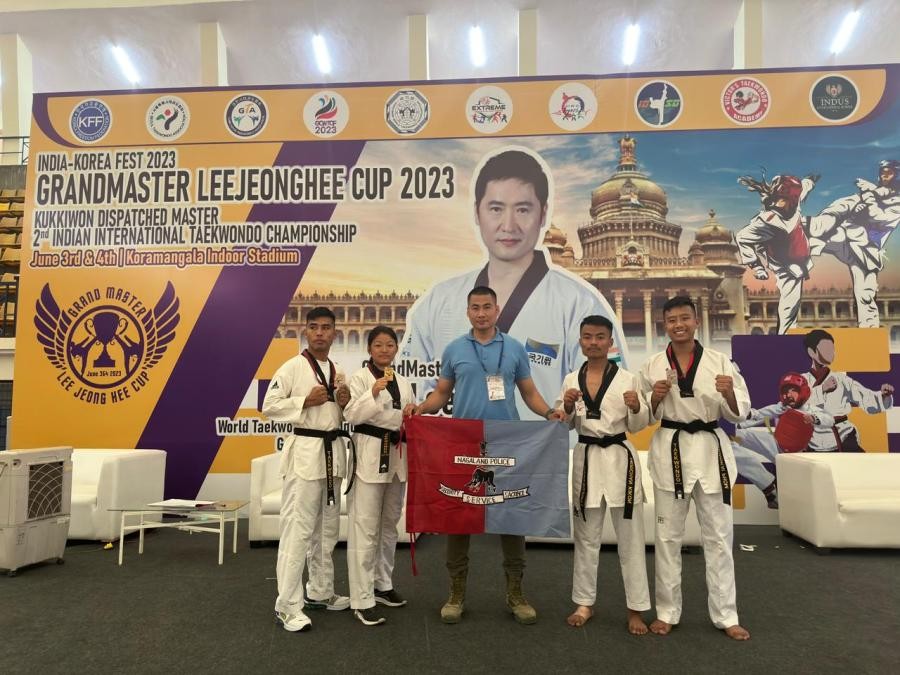 The medalists along with ABSI Seyievilie Nakhro, DGP Sports Team Taekwondo Coach in Bangalore.