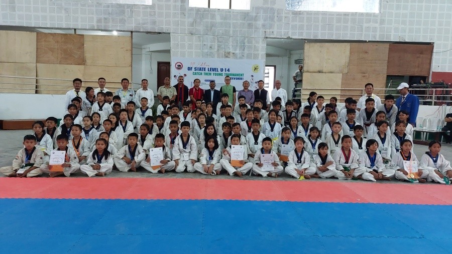 Dignitaries with the winners and participants of the 14th edition of State level U-14 Catch them Young Tournament (Taekwondo) at Indira Gandhi Stadium Kohima on July 20.