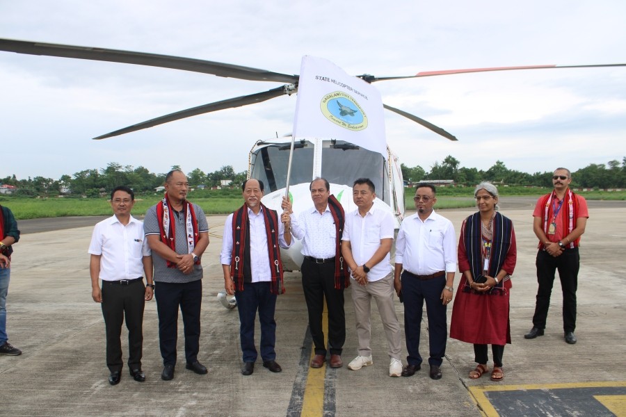 Nagaland Chief Minister Neiphiu Rio, Advisor Transport Temjenmemba, Managing Director Thumby Aviation Pvt  Ltd Capt KNG Nair, Dimapur Airport Director Geetha Sahu and others flag off renewed helicopter services for Nagaland at Dimapur Airport on July 12. (DIPR Photo)