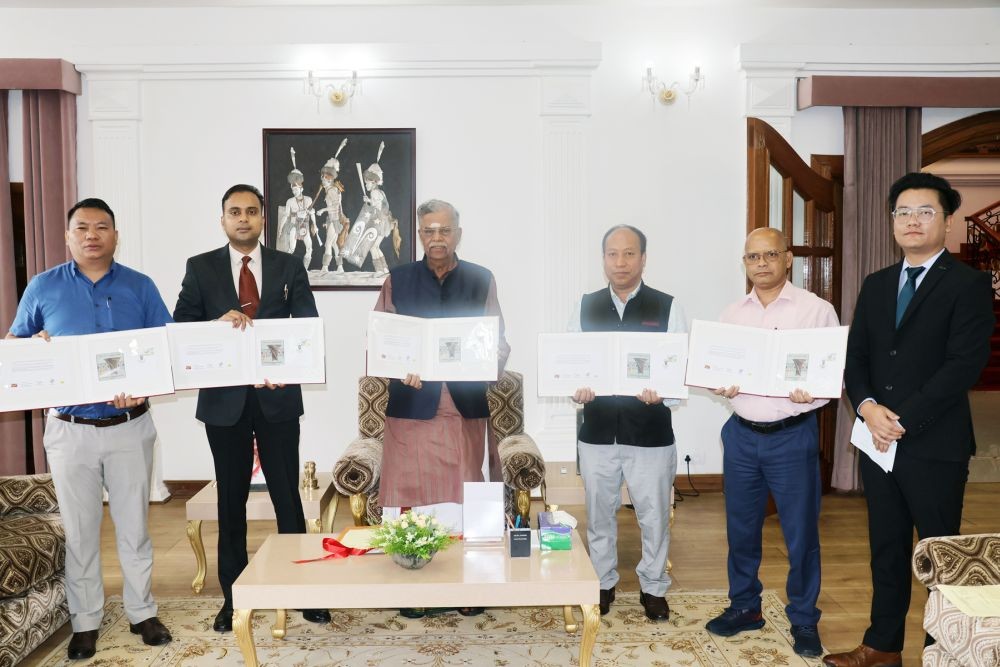 Governor of Nagaland, La Ganesan with Secretary to Governor, Rajesh Soundararajan and others during the release of special postal cover on Naga Back Basket on July 13 at Raj Bhavan, Kohima.