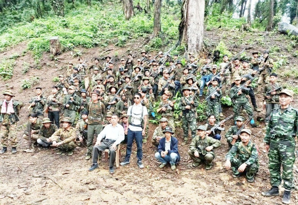 In this image released to the media, NSCN-K new chairman, Maj Gen (Rtd) Ang Mai is seen with a section of the Naga army in an undisclosed location in Myanmar area.