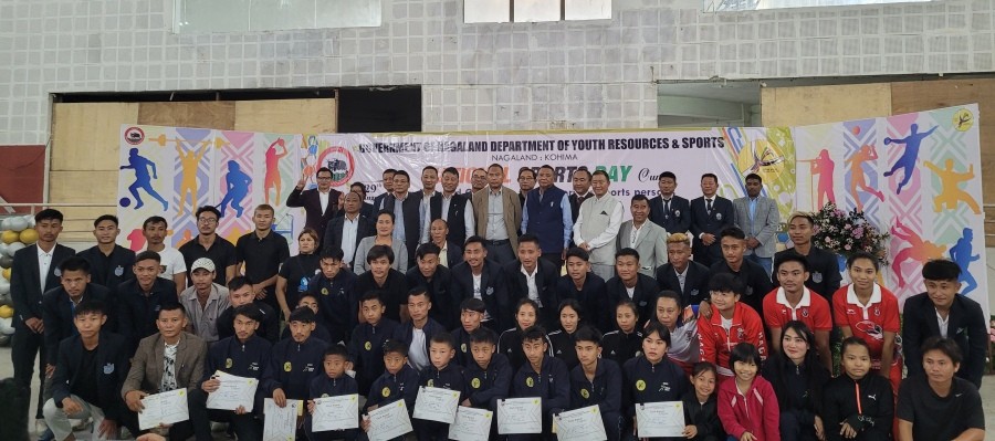 Officials and others with winners of  Gold