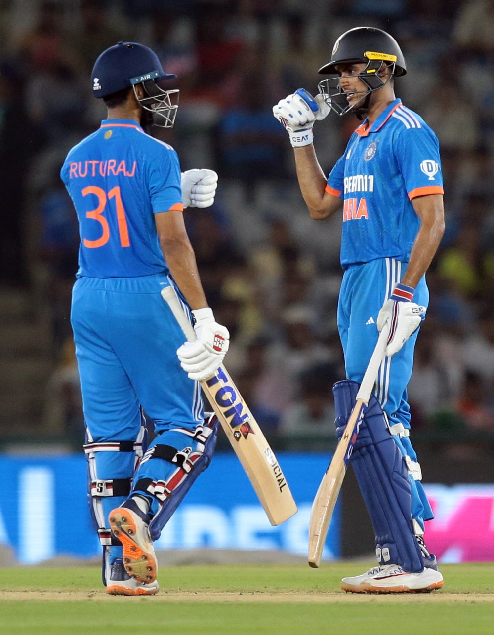 India's Shubman Gill and Ruturaj Gaikwad celebrate their partnership during the first ODI cricket match between India and Australia, in Mohali, on September 22. (IANS Photo)