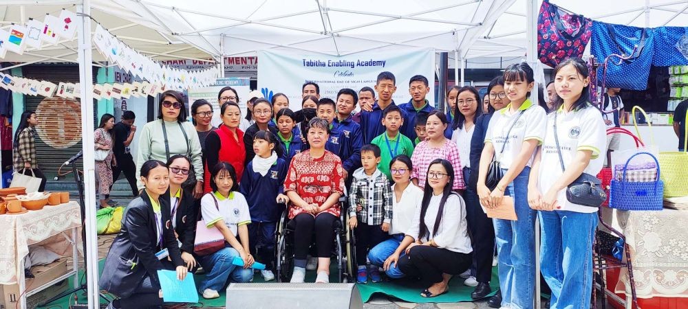 State Commissioner for Persons with Disabilities, Diethono Nakhro along with participants during an event organized on International Day of Sign Languages by Tabitha Enabling Academy at the Old NST Parking, Kohima on September 23. (Morung Photo)