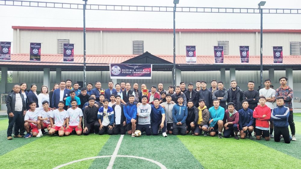 Anthony Ngullie with organizers and players of 2nd Kohima District Futsal Championship 2023 on October 6. (Morung Photo)