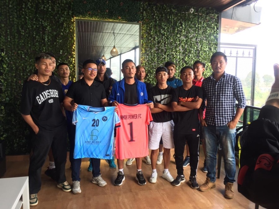Nimok Power FC players along with Zhiethrolhi Krome during the launching of its football jersey at Kohima on October 14.