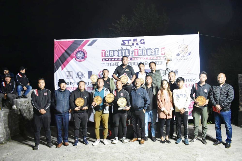 Winners from various categories pose with their trophies along with special invitees and officials during the prize distribution ceremony of the Stag Global Throttle Thrust V motorsport event organised by Spearhead Motorsport Initiative on November 4. (Morung Photo)