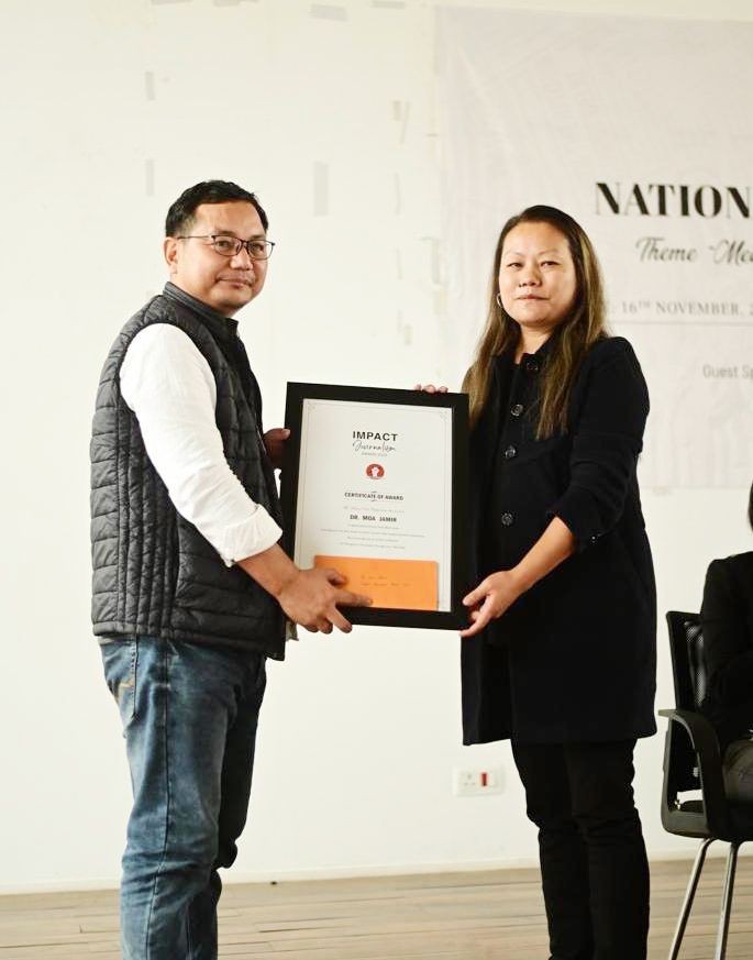 Dr Moalemba Jamir being conferred the KPC Impact Journalism Award 2022 by KPC President, Alice Yhoshü. (Morung Photo)