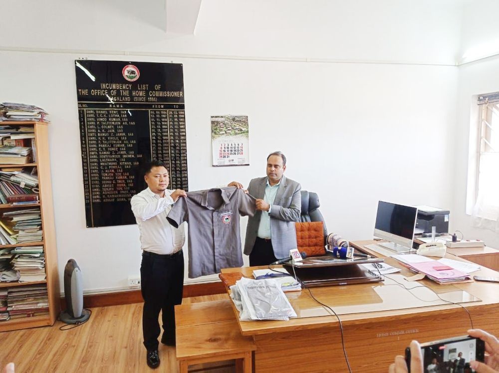 Home Commissioner Abhijit Sinha introducing the uniform for Nagaland Civil Secretariat Grade IV staff on Wednesday. (Morung Photo)